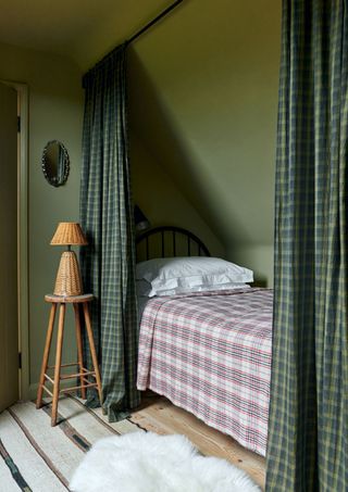 Image may contain Furniture Indoors Room Bedroom Bed Interior Design Lamp and Table Lamp