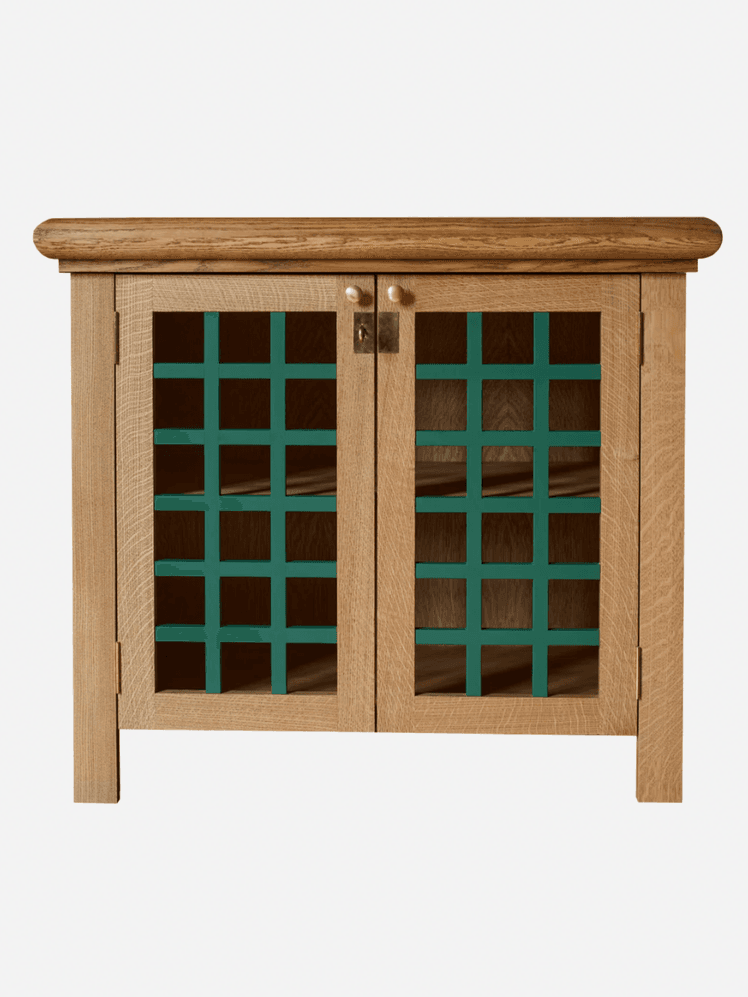 Image may contain Furniture Sideboard Cabinet Closet Cupboard Wood Den and Indoors